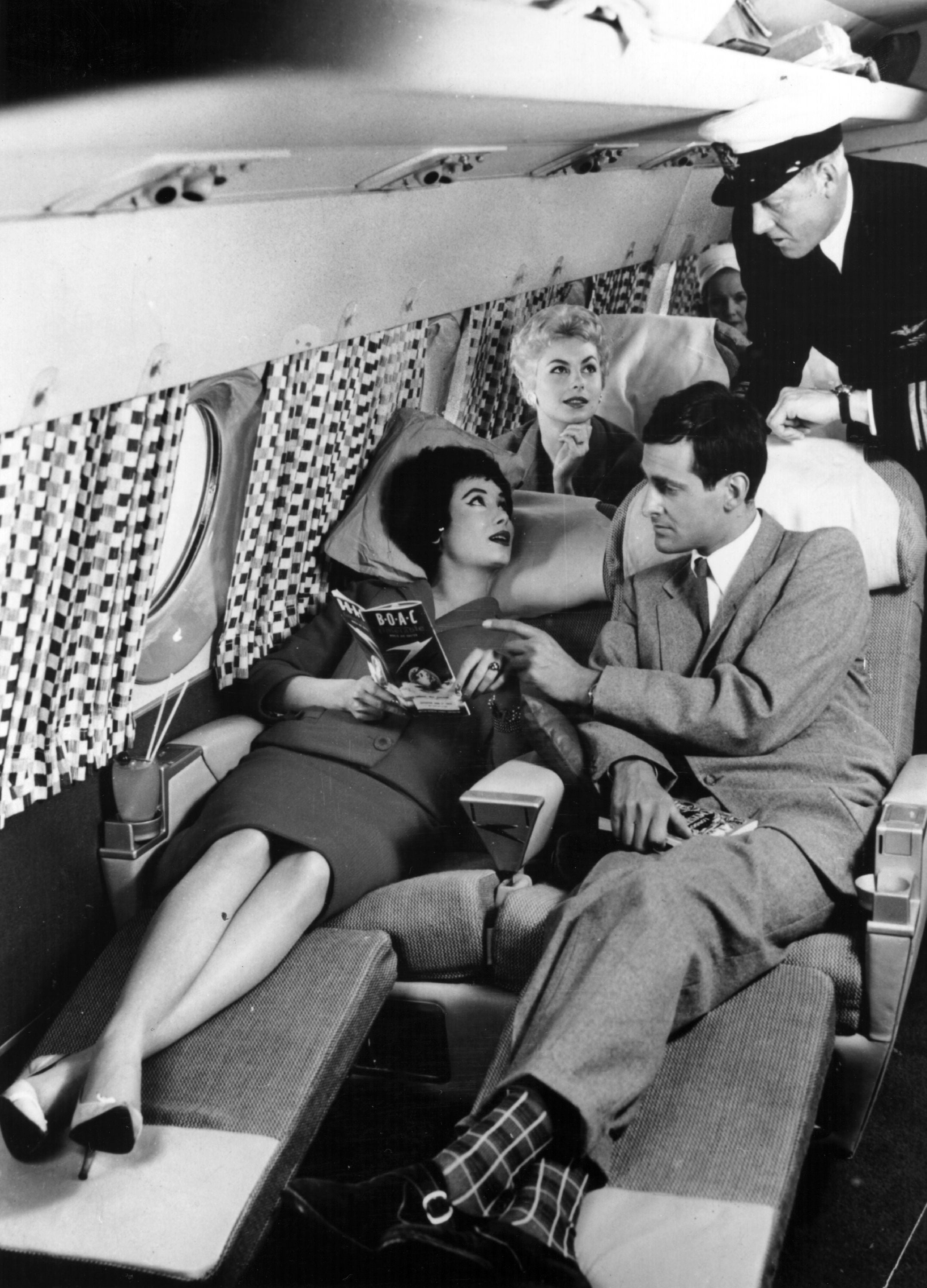 28th August 1958: Passengers relaxing on the sleeper seats in the new Comet 4 during a demonstration flight at Hatfield. The plane, which is fitted out in accordance with an interior decor scheme designed for BOAC aircraft by Gaby Schreiber, flew from New York to London in under six and a half hours. (Photo by Douglas Miller/Keystone/Getty Images)