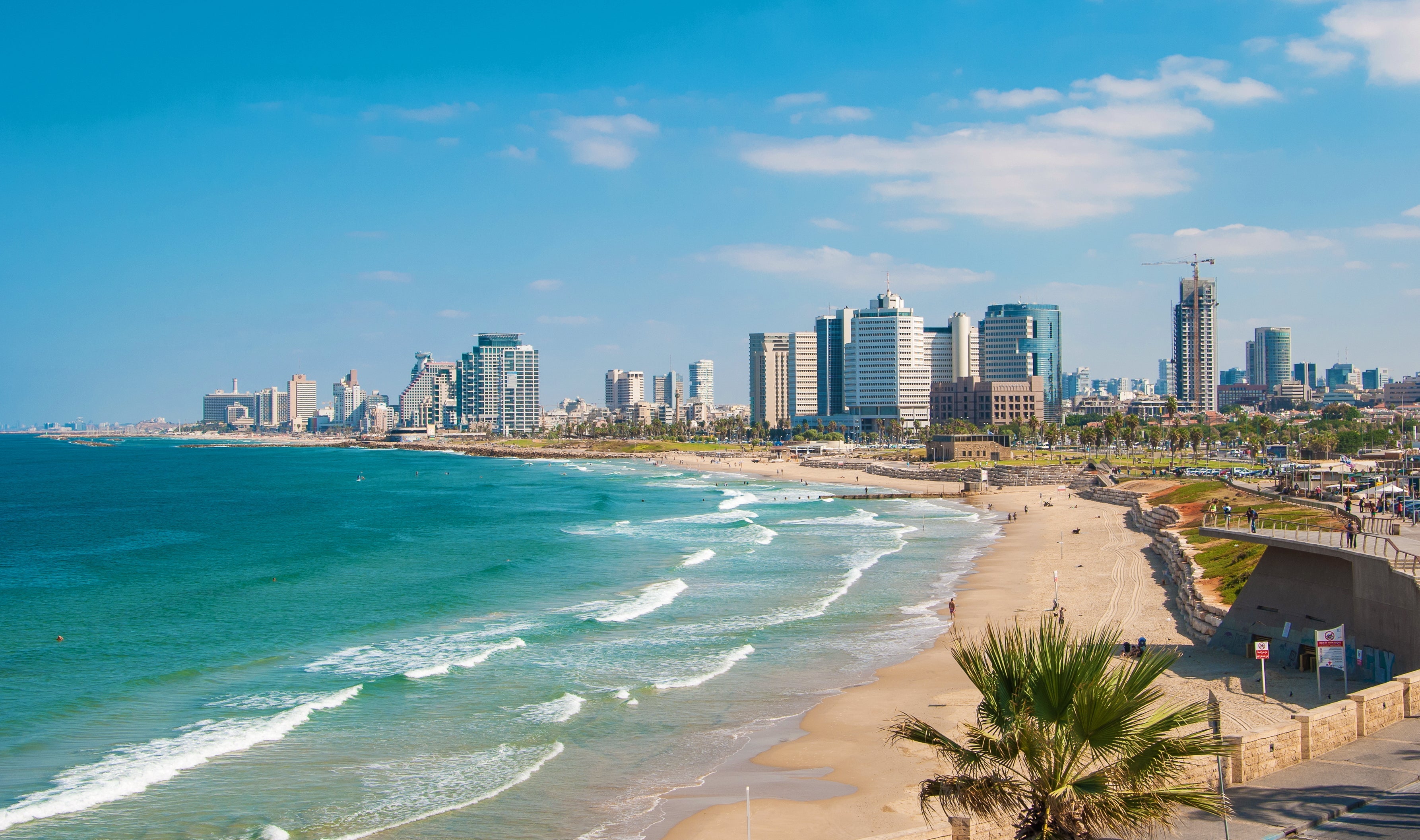 Doesn't a trip to the beaches of Tel Aviv sound great right about now? (Photo by Dance60 / Getty Images)