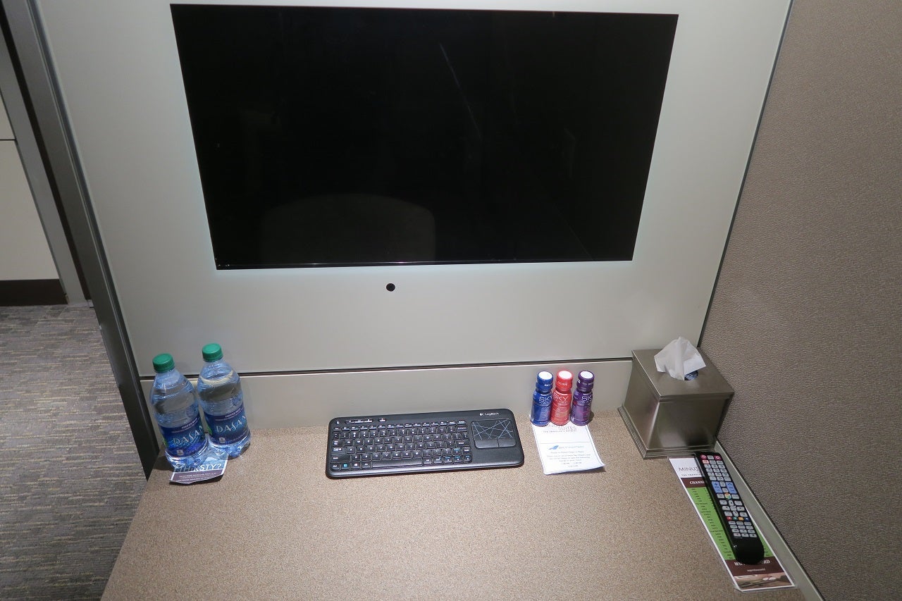 Minute Suites ATL desk with screen and keyboard
