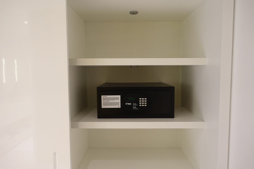 The safe and shelving.
