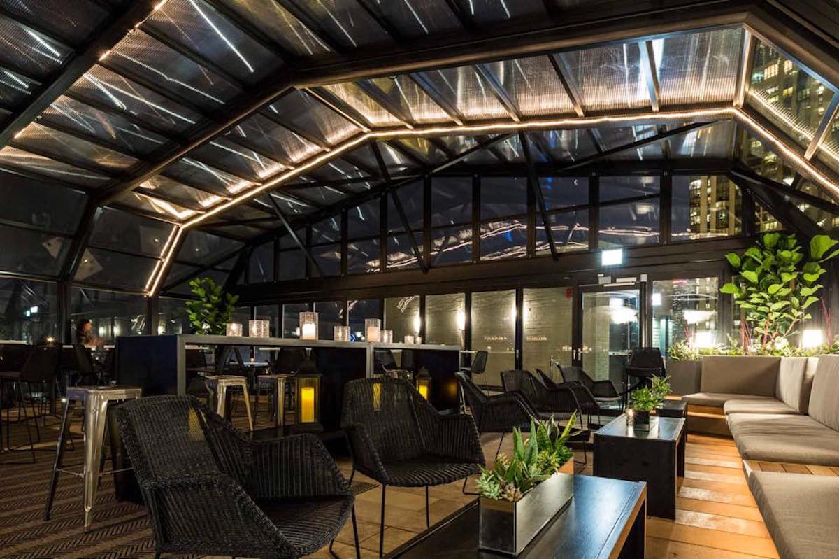 The J. Parker's retractable roof means sky-high cocktails are available all year long. Image courtesy of The J. Parker's Facebook page.