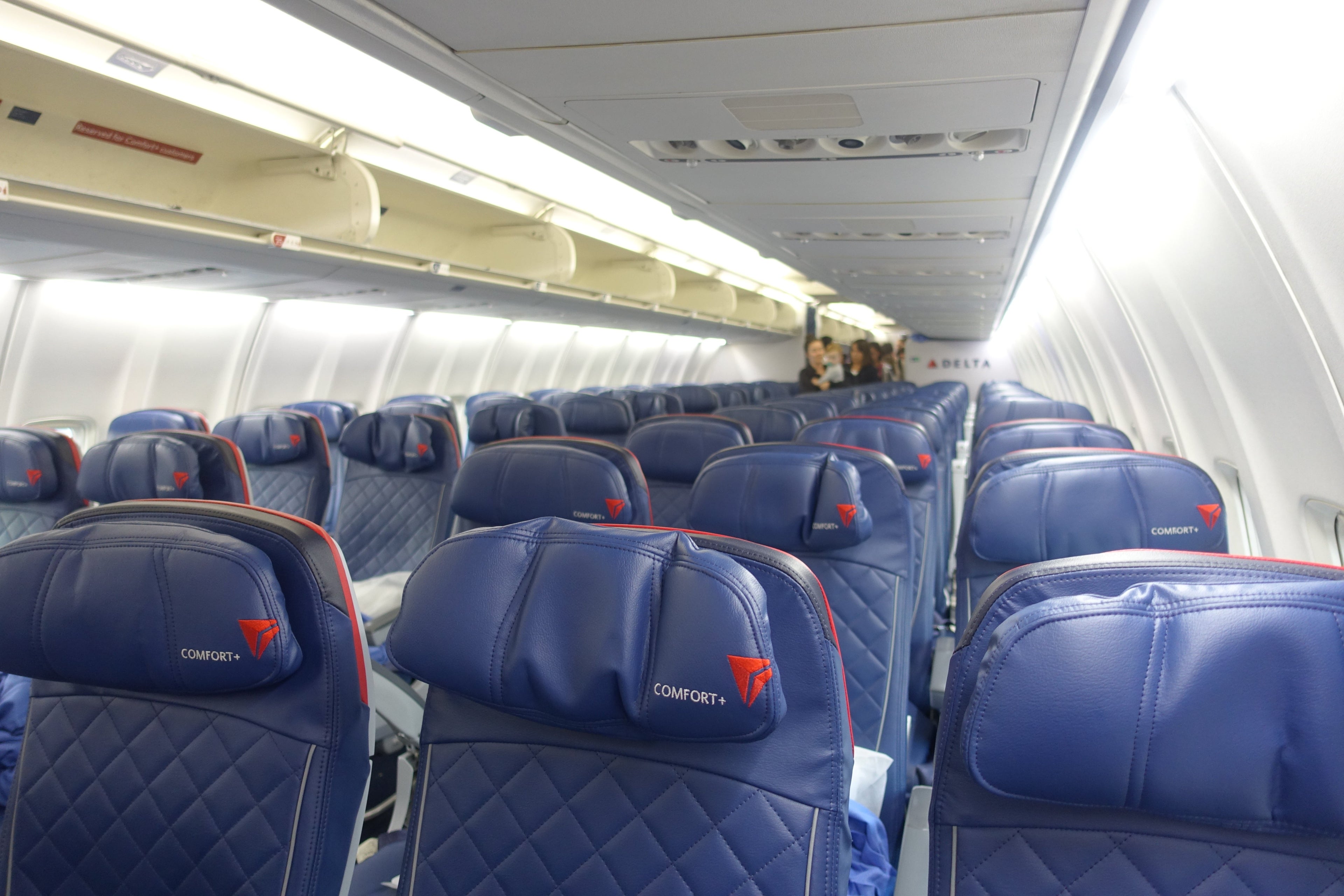 Comfort+ with the Main Cabin a few rows behind. Note this was taken after landing at JFK