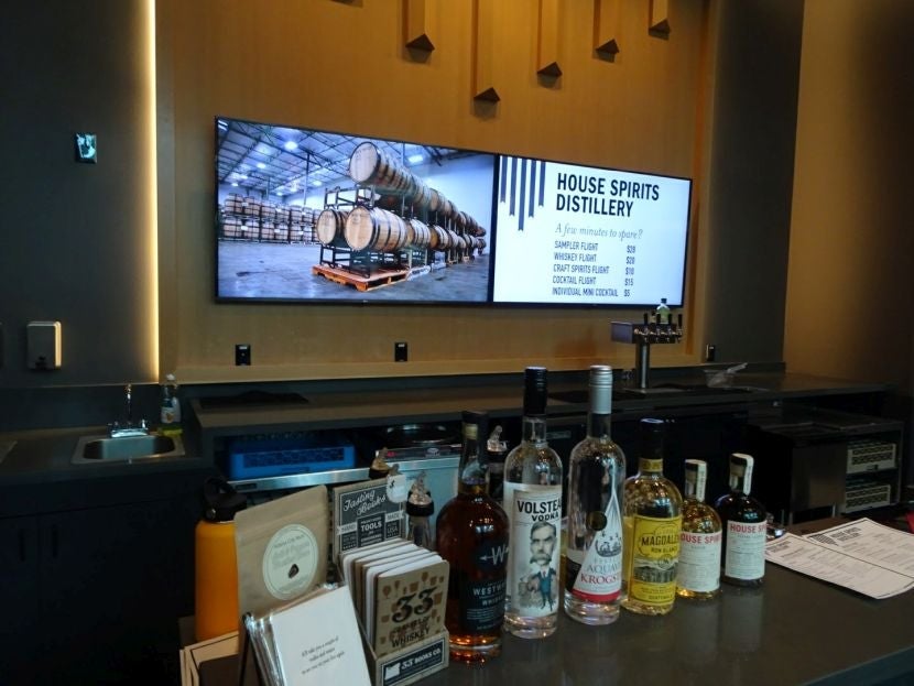 The bar shows off some of the distillery's products.