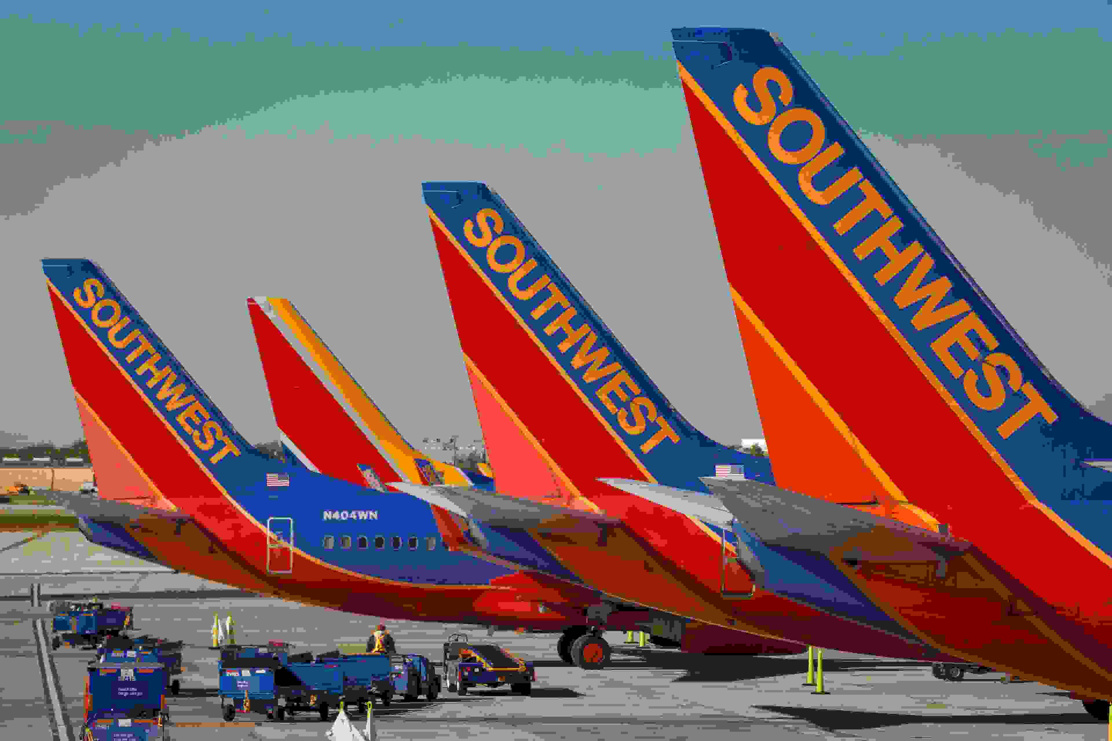 Southwest Airlines Boeing 737 planes prepare for takeoff at William P. Hobby international airport in Houston Texas, on November 18, 2015. (Photo by John Gress/Corbis via Getty Images)