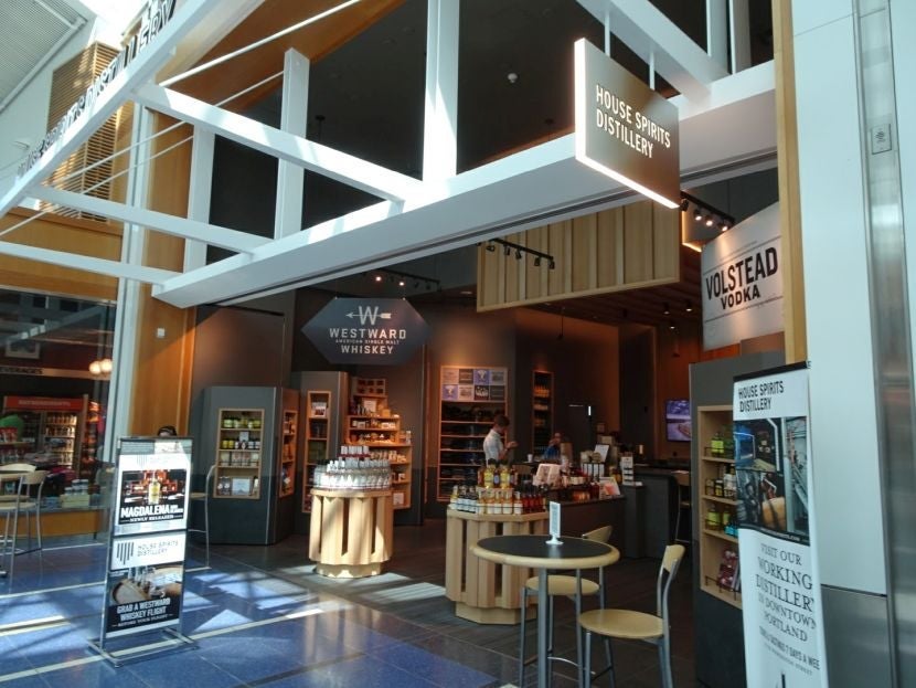 The House Spirits Distillery at PDX has great items for sale, but not all are free with Priority Pass.
