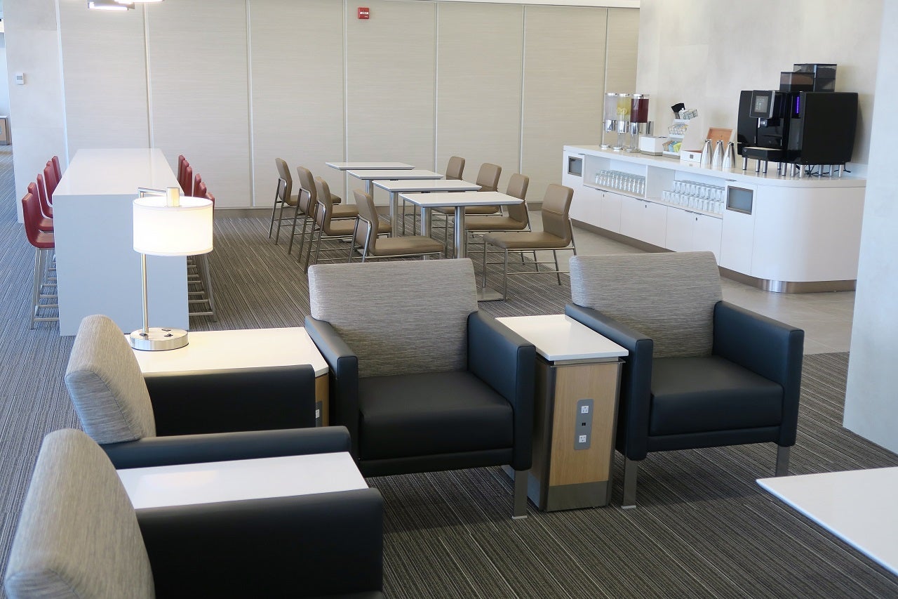 AA ORD Flagship Lounge - sitting area with coffee machine