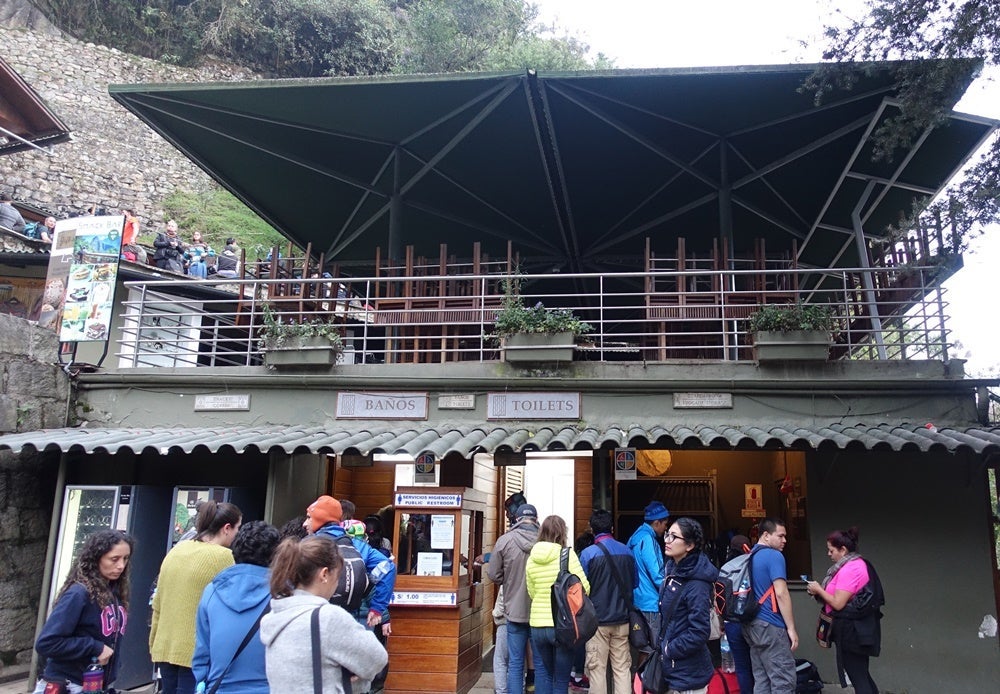 Crowds outside the only bathrooms, which are just outside the entrance of Machu Picchu.