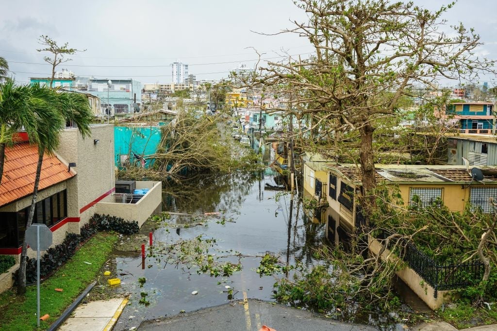 SAN JUAN, PUERTO RICO SEPTEMBER 22: Trees and flood water block a street after Hurricane Maria at Baldorioty Avenue in Carolina, Puerto Rico on September 22, 2017. (Photo by Pablo Pantoja/Anadolu Agency/Getty Images)