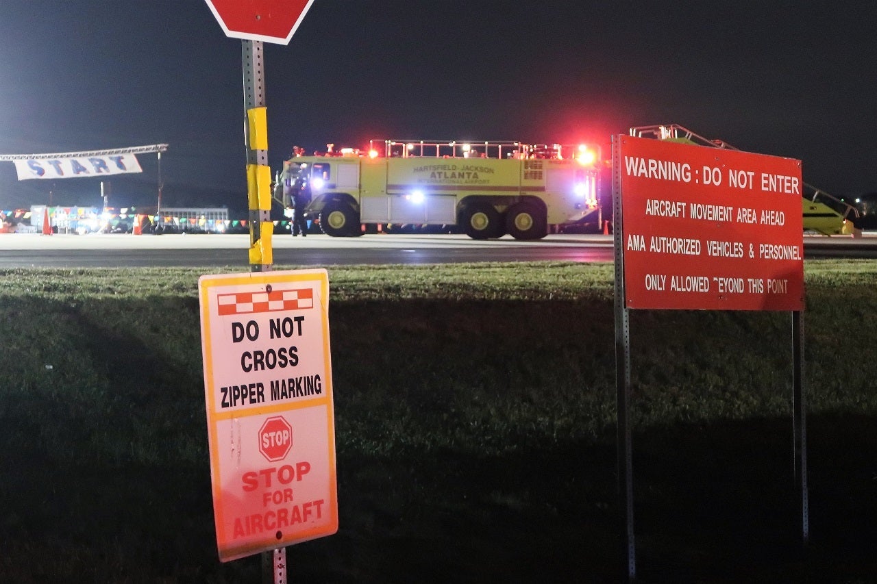 ATL 5K on the Runway start line and stop sign
