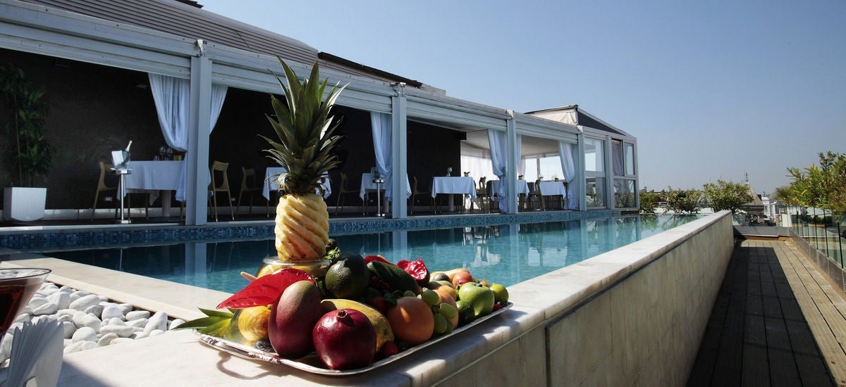 Relax in the outdoor pool at this Autograph Collection Marriott property. Image by hotel.