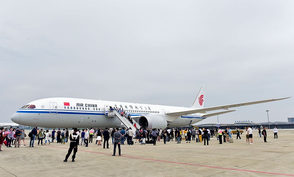 CHENGDU, CHINA - MAY 26: (CHINA OUT) The image shows the Boeing 787-9 Dreamliner at Chengdu Shuangliu International Airport on May 26, 2016 in Chengdu, Sichuan Province of China. China's first medium-sized Boeing 787-9 Dreamliner aircraft purchaced by Air China from Boeing Factory, America, makes the first flight named CA4102 from Beijing to Chengdu after nearly three hours on Thursday. The Boeing 787-9 is the latest model of Boeing 787 series. Air China will schedule the aircraft to operate Beijing-Shanghai, Beijing-Guangzhou, Sanya-Beijing-Frankfurt, Beijing-Rome routes in the future. (Photo by Lyu Jia/Huaxi Metropolis Daily/VCG)***_***
