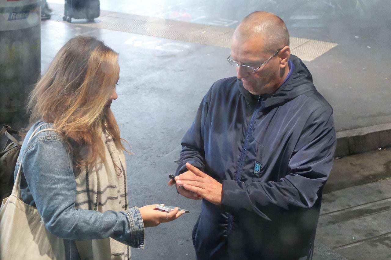 The driver used his phone to scan passenger tickets.