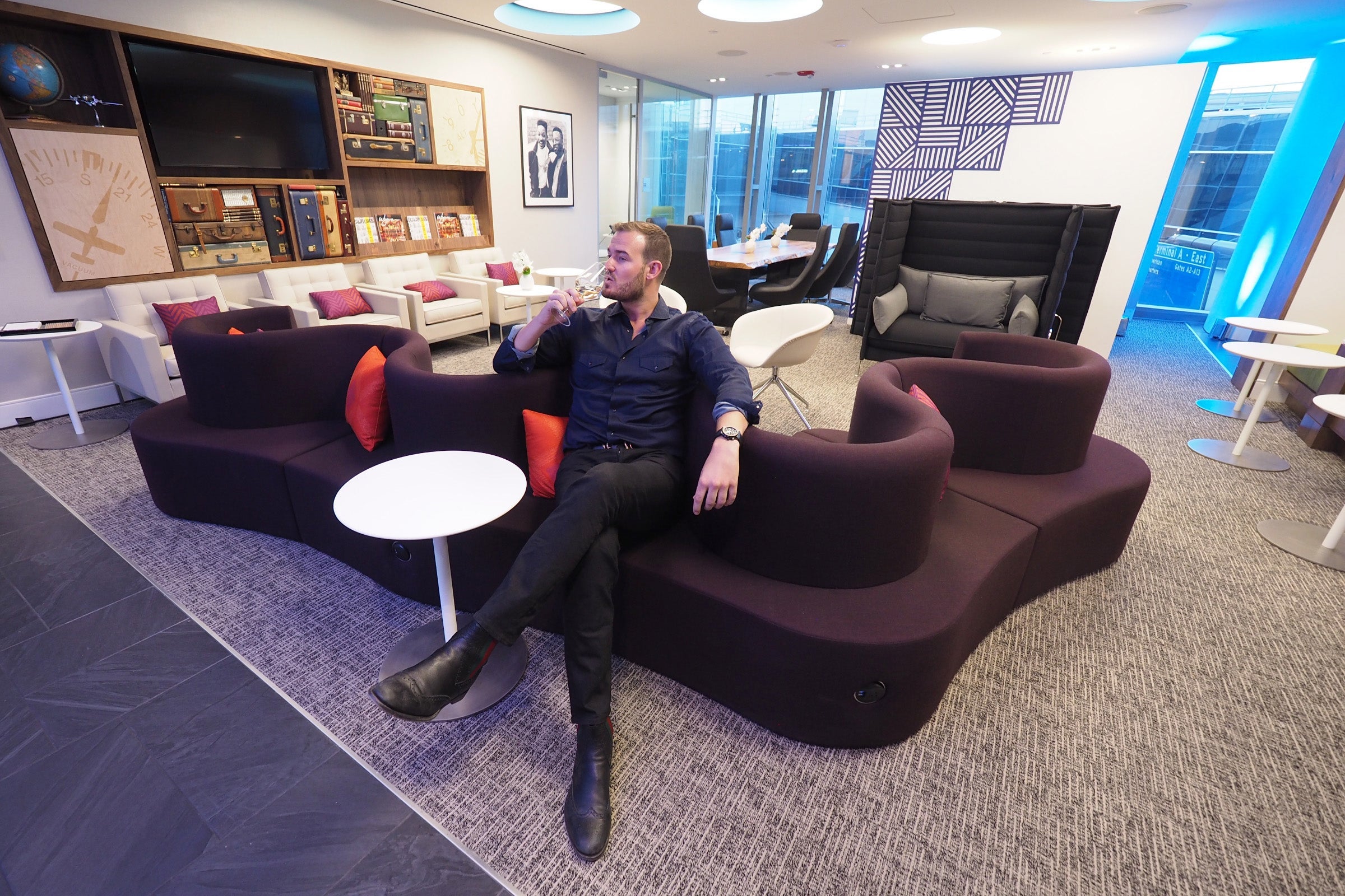 Brian Kelly enjoying a drink at the Philadelphia Centurion Lounge