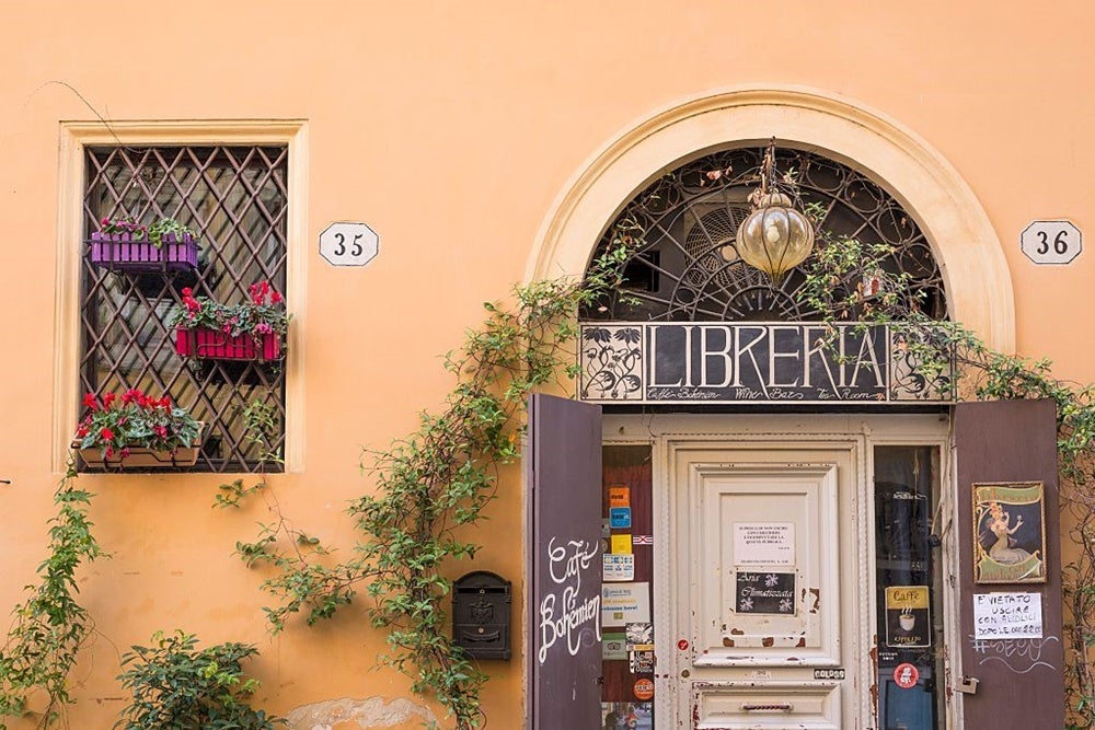 Stroll the quaint streets of Trastevere. Image by Loop Images/UIG via Getty Images.