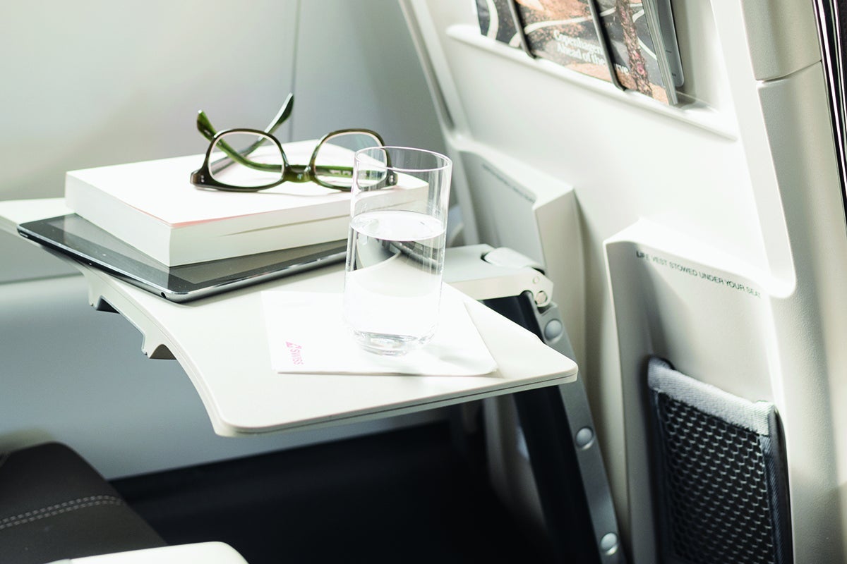 Ergonomically designed tray tables and carveouts for maximum knee space.