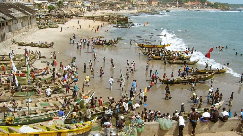 Fishing boats in front of Cape Coast Castle, Ghana
