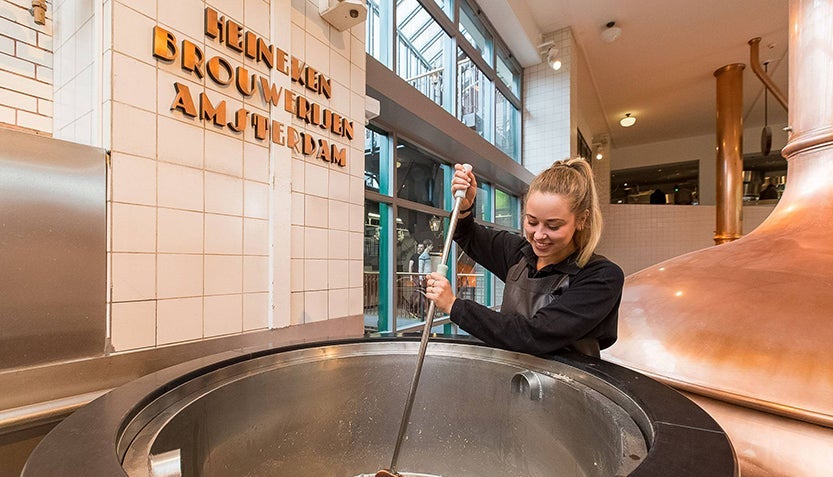 Beer brewing at the Heineken Experience Museum.