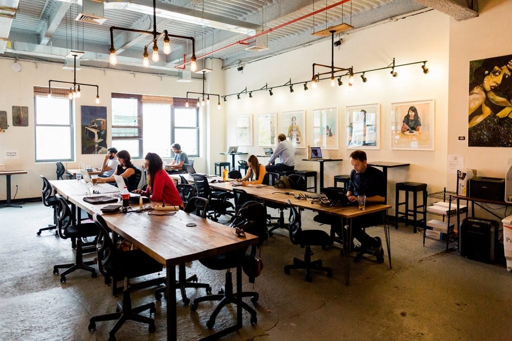 Hot desks at BrooklynWorks (via BrooklynWorks)