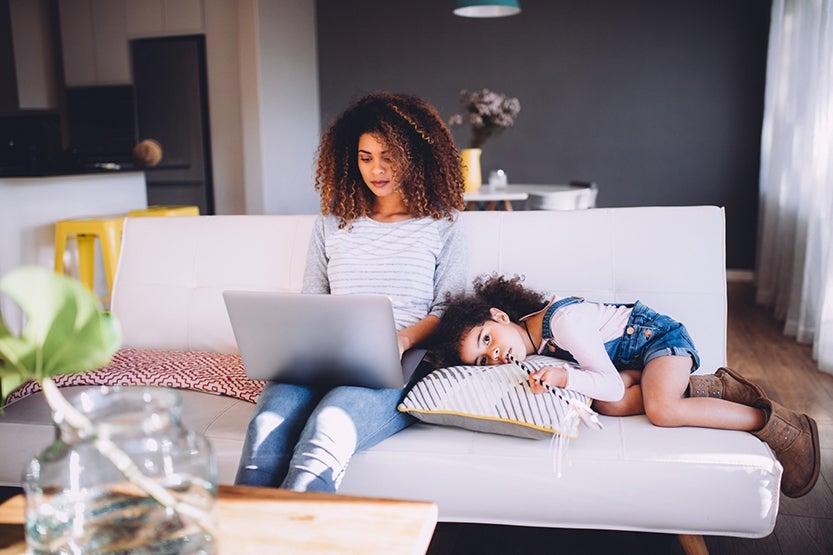 Mom working at home with child