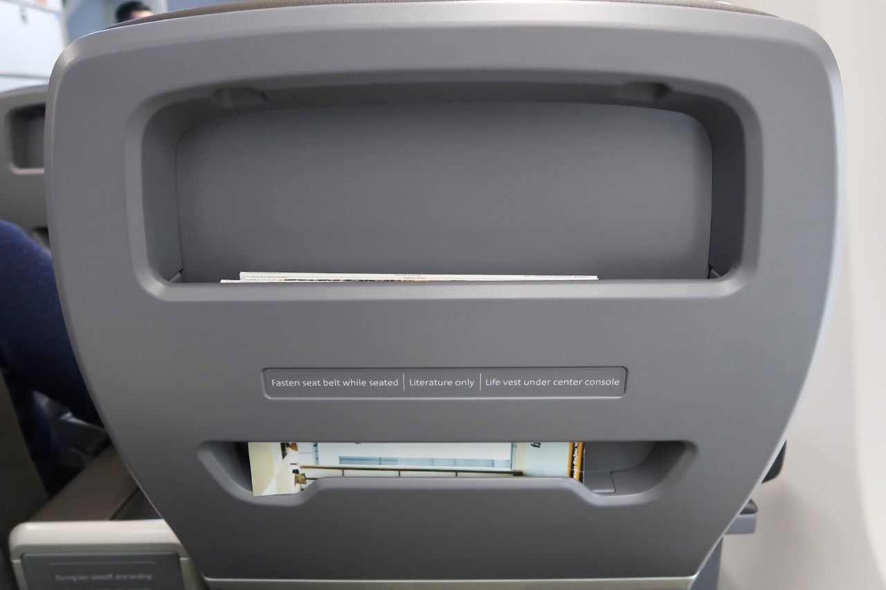 Seatback of AA 737 MAX first class seat. Photo by JT Genter / The Points Guy