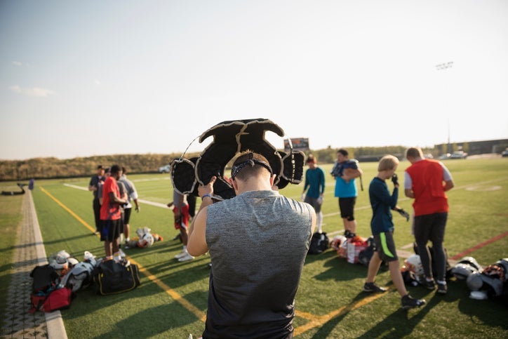Athletic scouts spend months on the road to determine the top athletes to recruit next season. Image by Hero Images/Getty Images