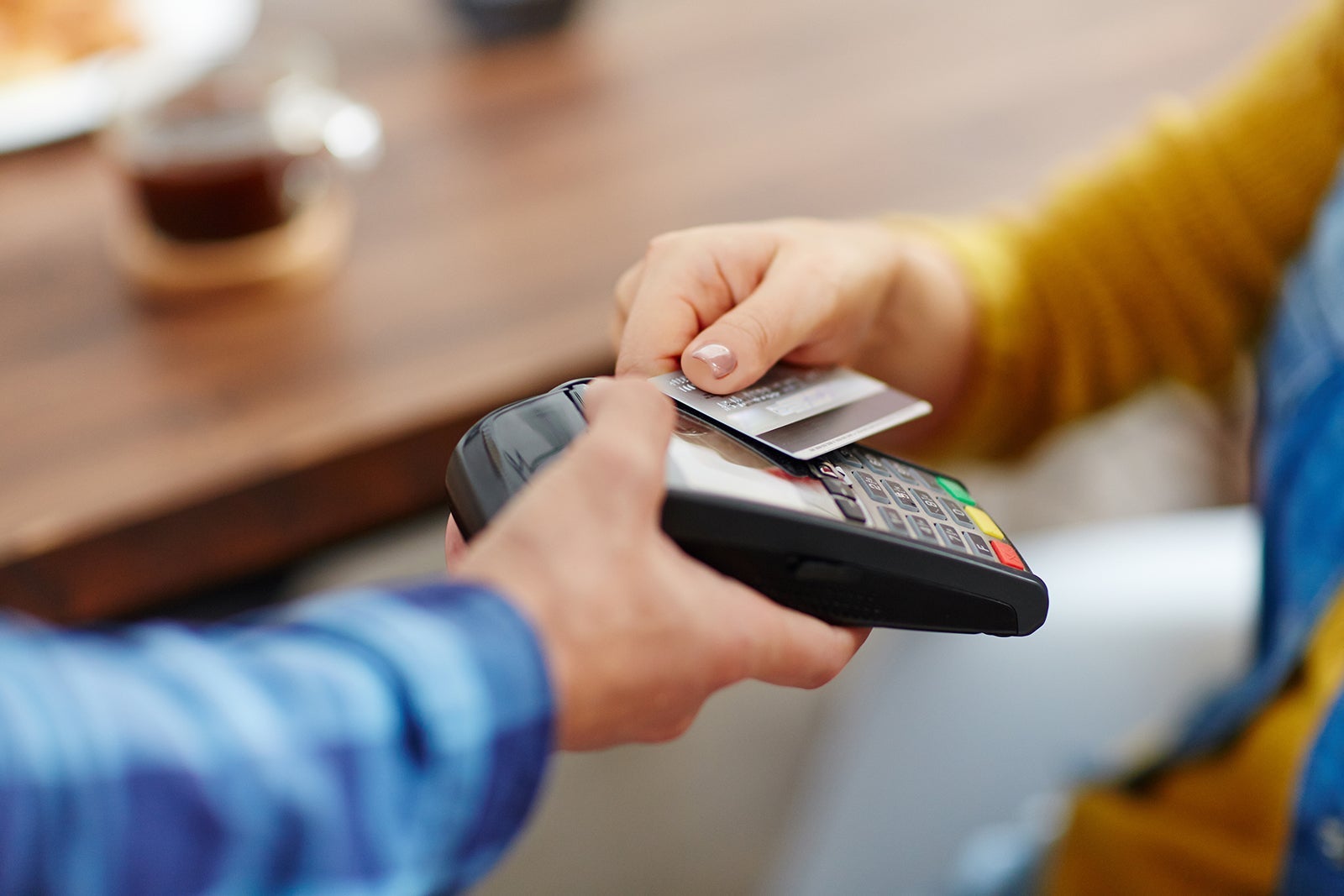 Woman paying with a credit card