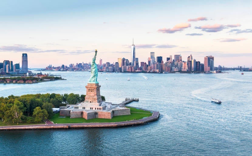 Viator Photo ID: 366587 / Orig name: Viator_Getty_349186.jpg / Source Type: Getty / Source ID: 349186 / Desc: USA, New York State, New York City, Aerial view of city with Statue of Liberty at sunset / / Notes: Getty Images/Tetra images RF / This content is subject to copyright. / Tetra Images / Tags: Viator, Aerial View, Statue Of Liberty, ellis island, liberty island, new york city, usa, united states, north america, NYC, New York / Photographer: Tetra Images / Uploaded by: acruz / Edited by: egonzales /