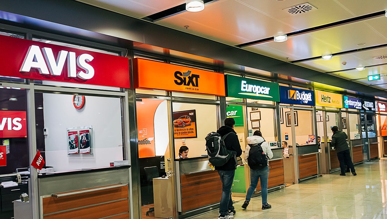 Istanbul, Turkey - January 17, 2015: Most common rental car offices side by side on Sabiha Gokcen Airport in Istanbul. Including Avis, Sixth, Europacar, Budget, Hertz.