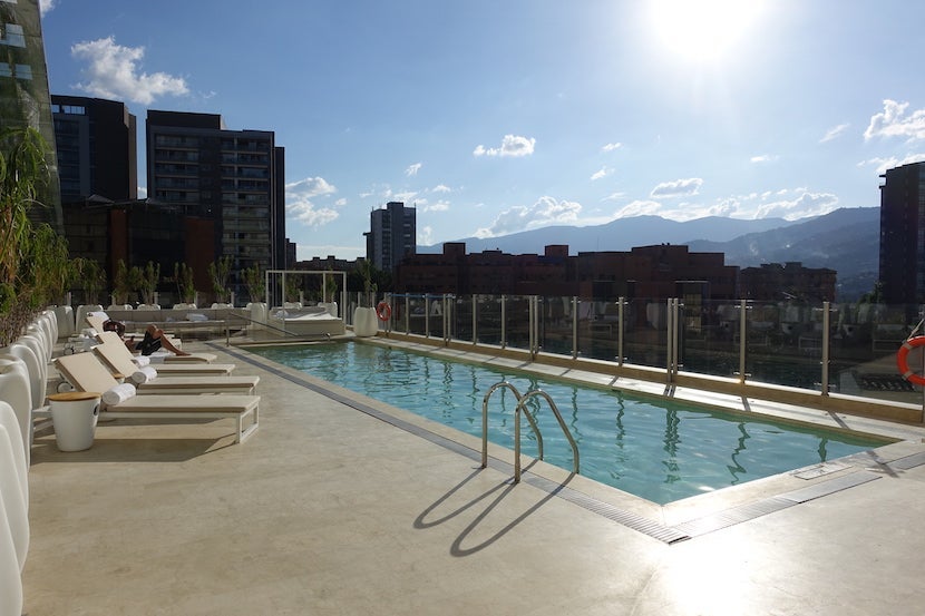 a rooftop pool at a hotel