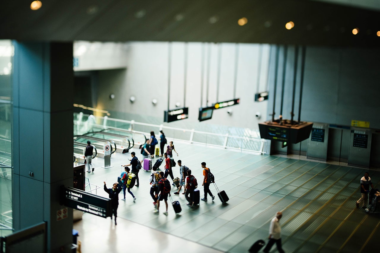People walking in an airport terminal