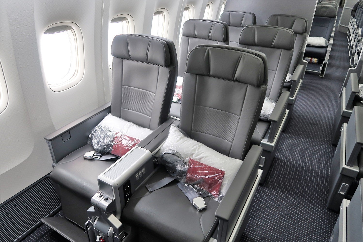 Window seats in premium economy on American Airlines' Boeing 777-200. Image by JT Genter / The Points Guy