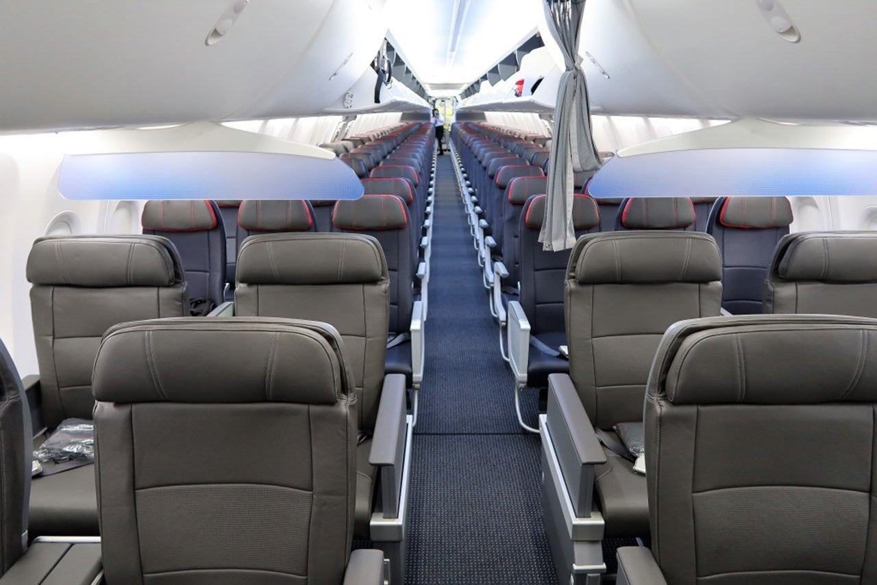 An American Airlines 737 Max 8 plane interior. Single aisle aircraft are not required by the ADA to have a wheelchair accessible bathroom.
