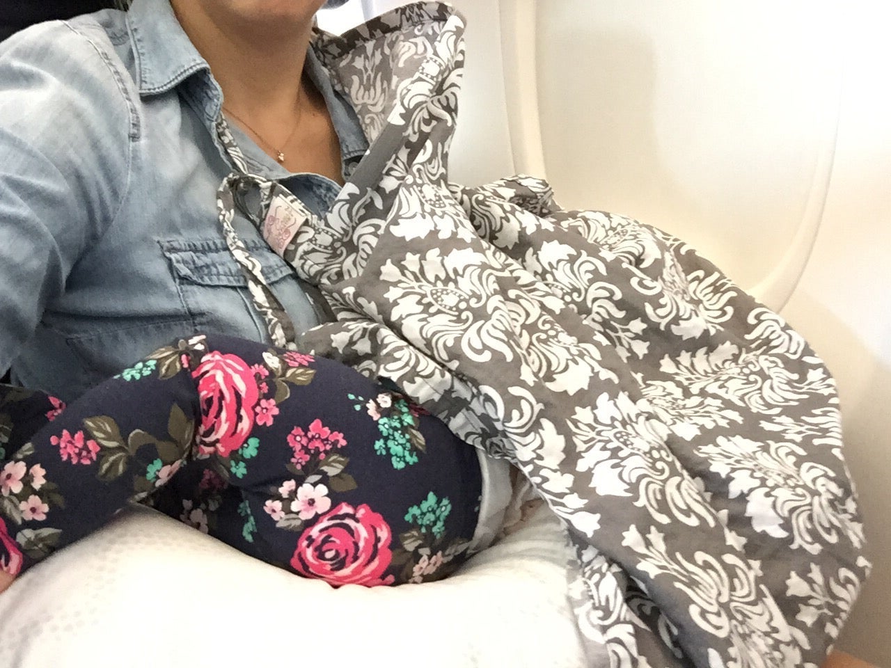 Baby nursing on a plane