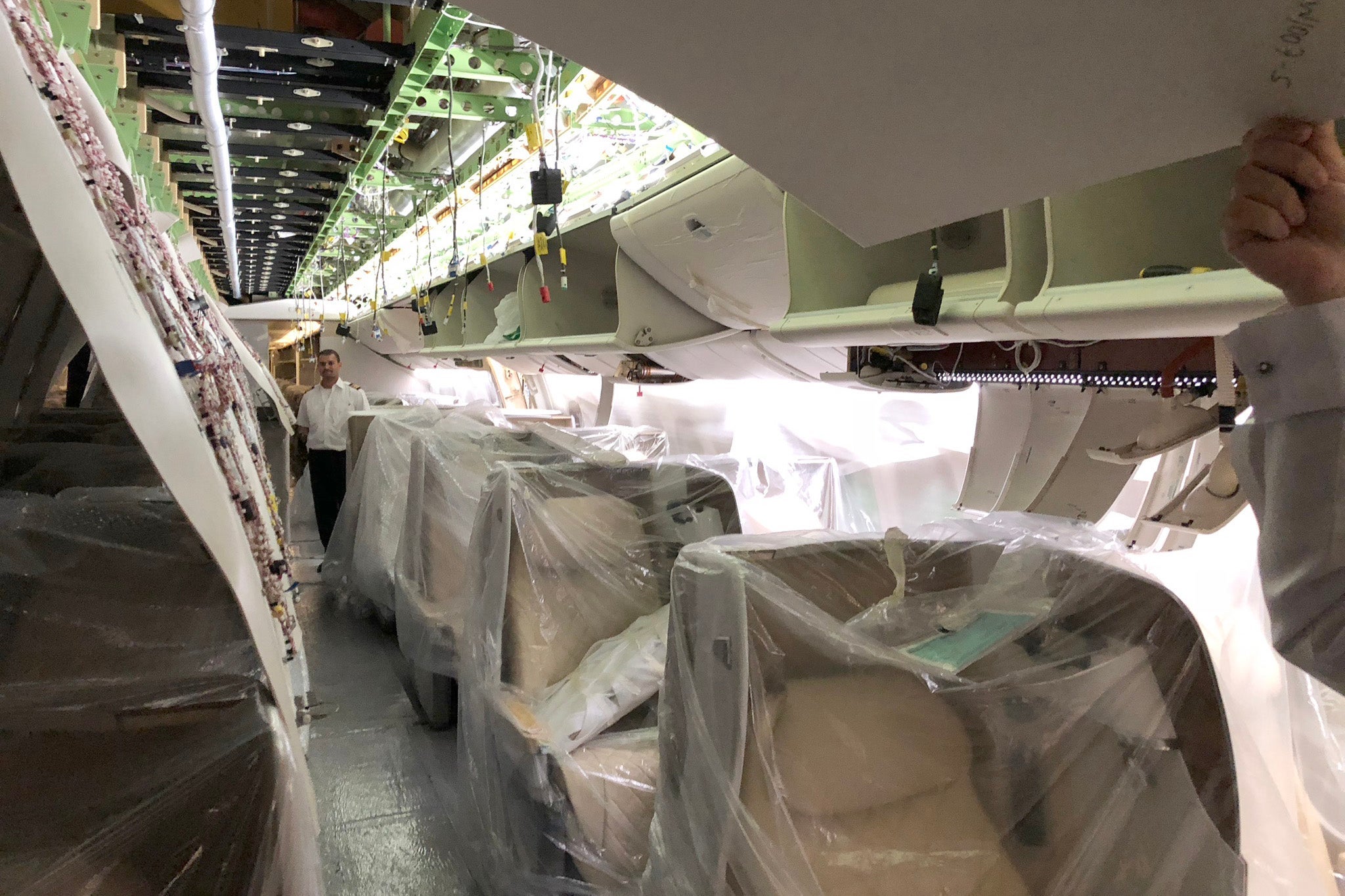 Emirates installed brand-new lie-flat business seats on its 777-200LR. Photo by Zach Honig.