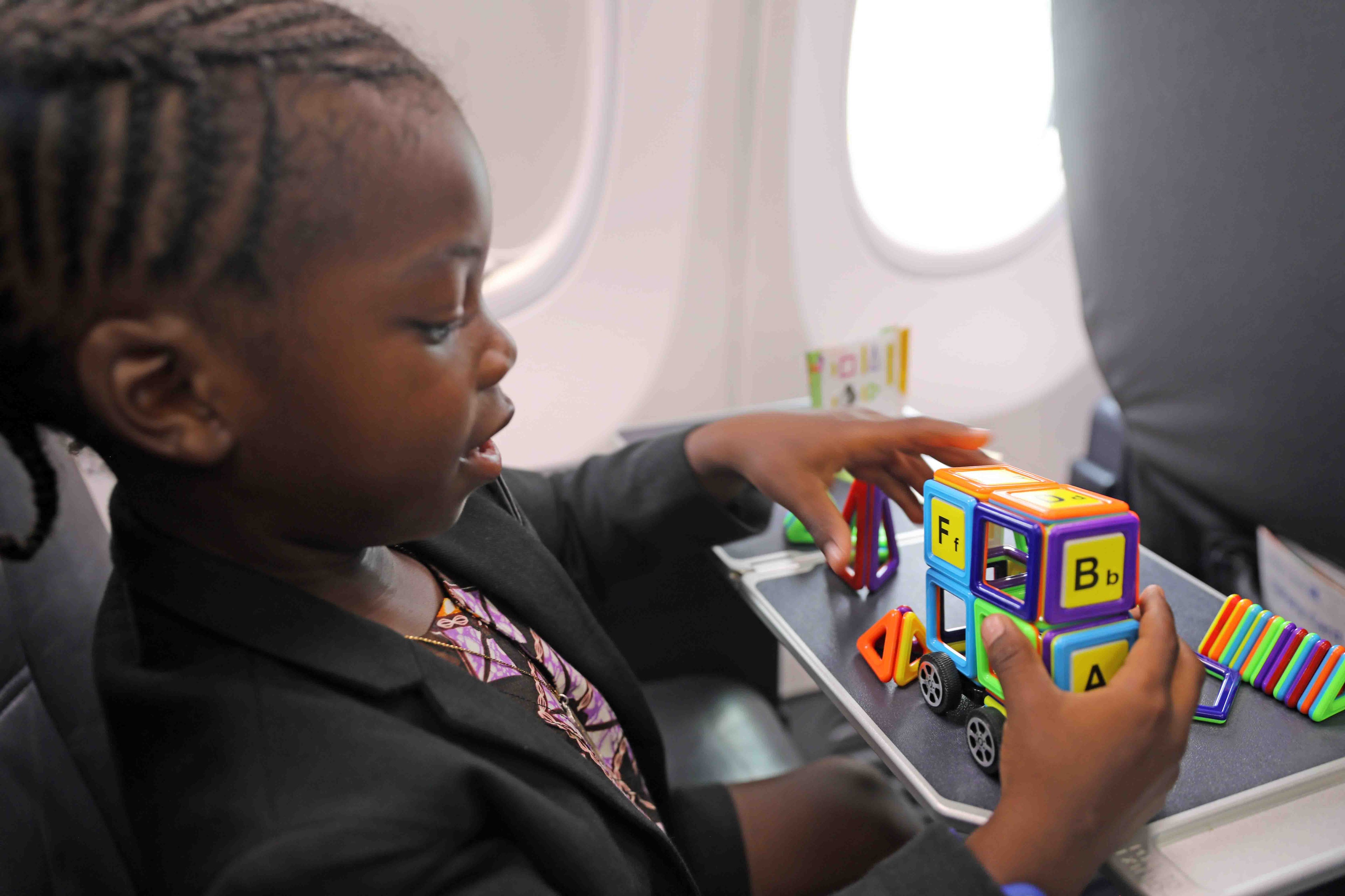 pack toys to keep the kids busy in-flight