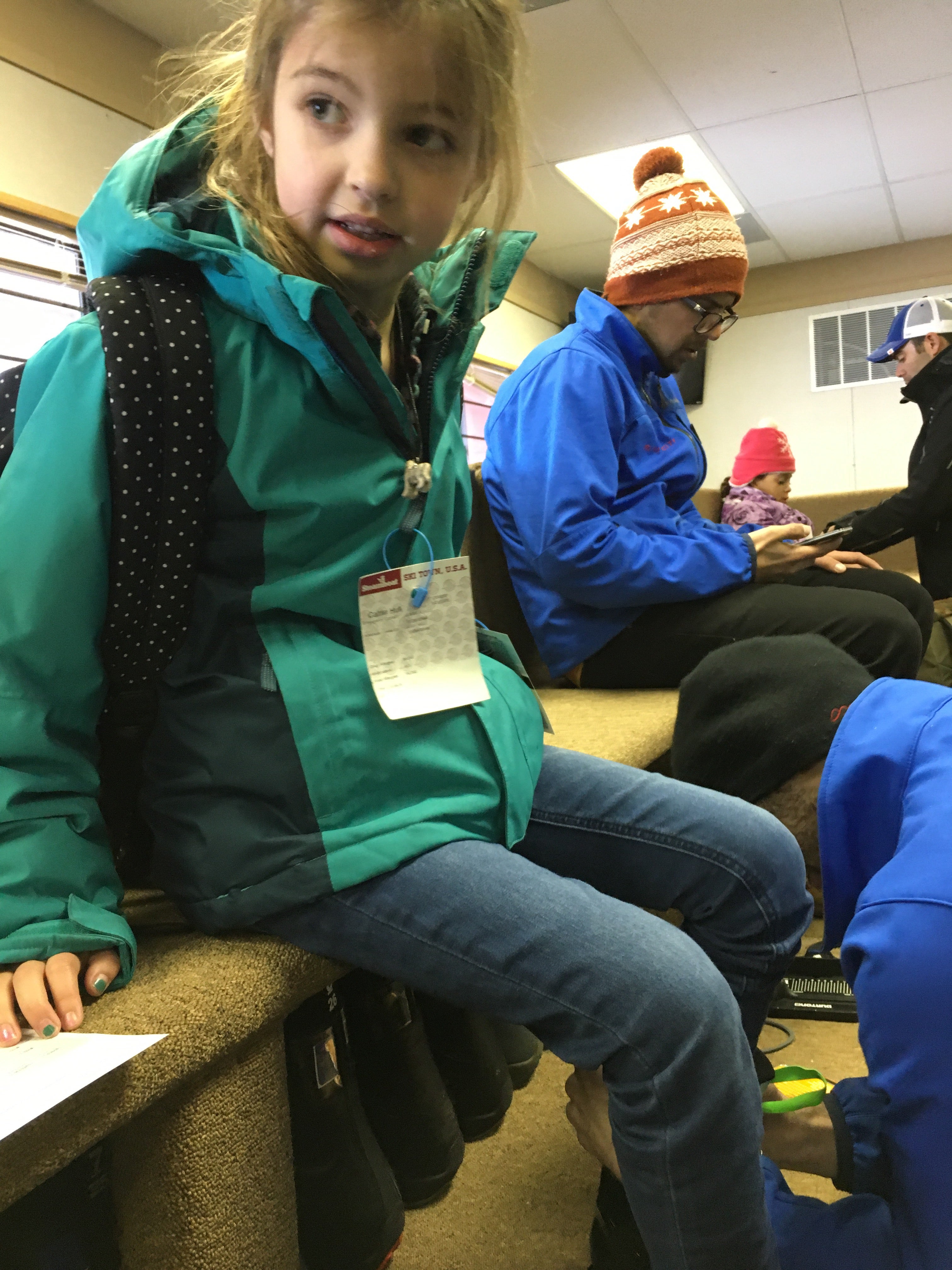Getting fitted for skis in the area just for Epic 5 skiers