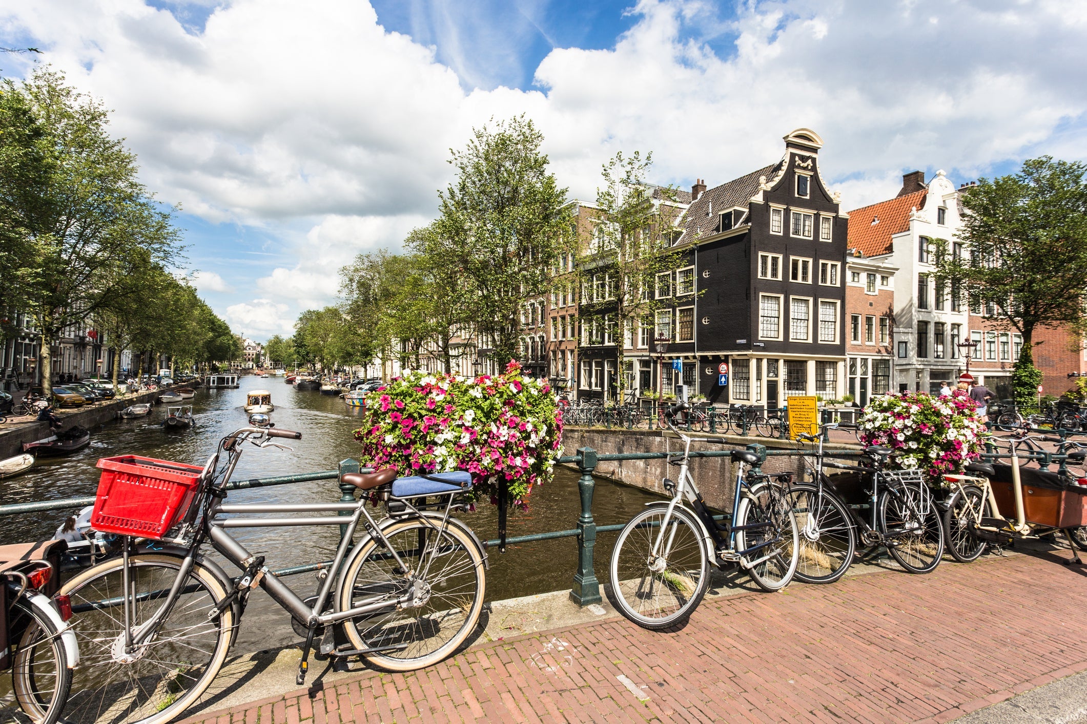 Amsterdam is a beautiful city to visit all year long. (Photo by Didier Marti / Getty Images)