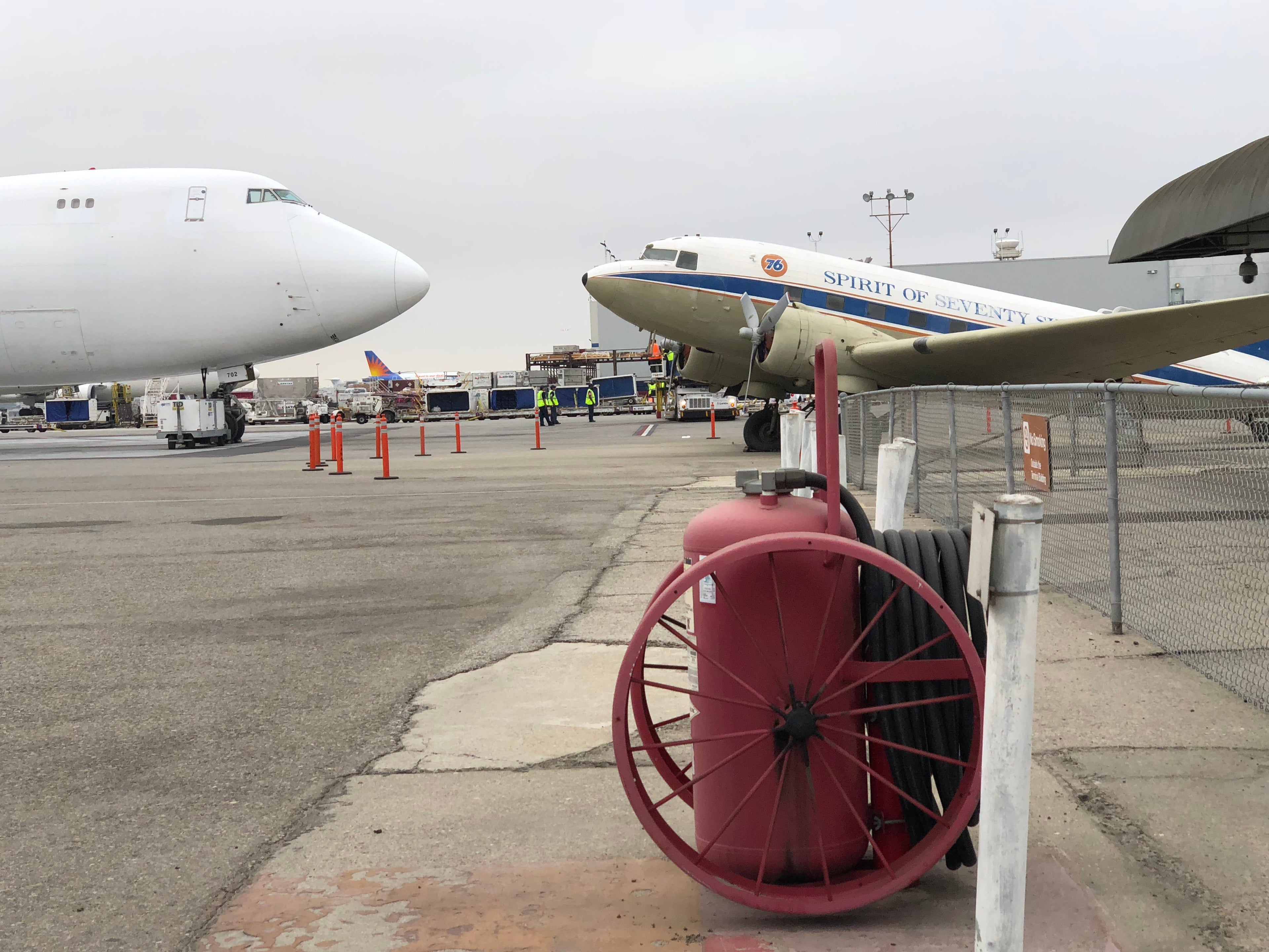 Union 76 plane circa 1940 nose to nose with Kalitta Air cargo 747