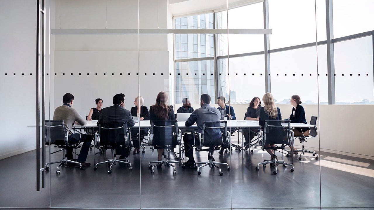 Colleagues at business meeting in conference room