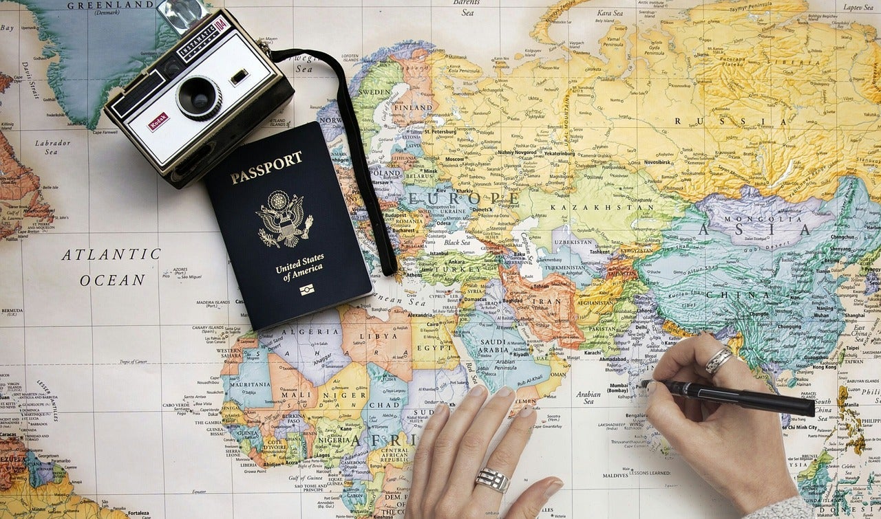 A woman mapping out travel