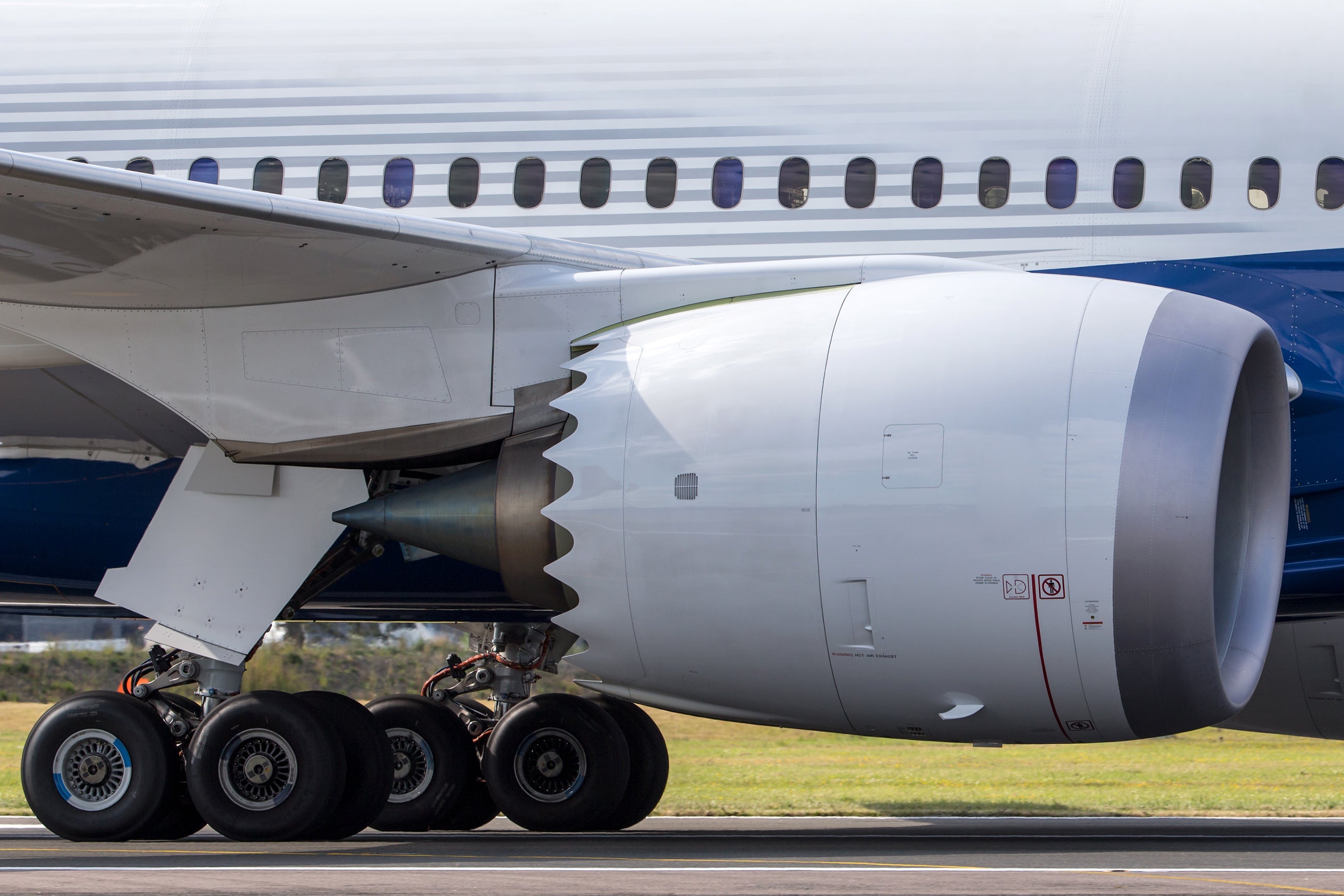 Close up view of engine and landing gear of Boeing