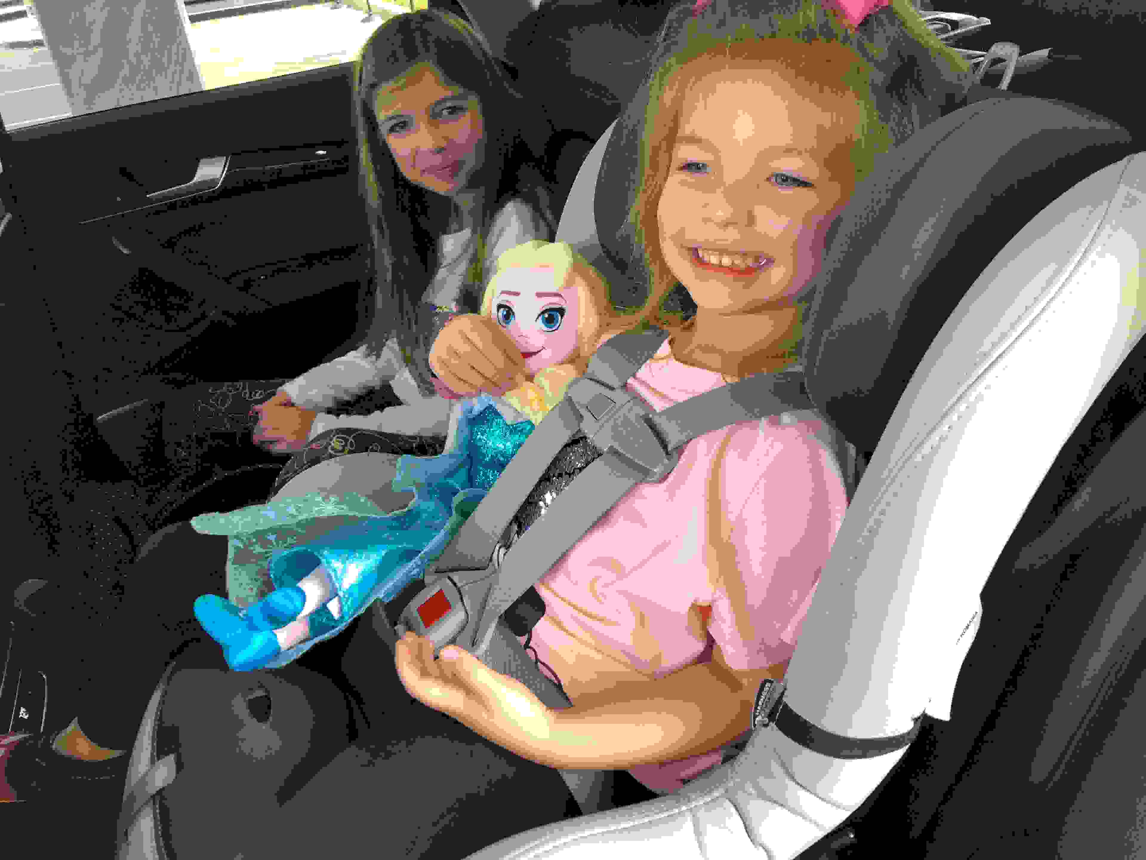 Happy in a free Silvercar car seat (Photo by Summer Hull / The Points Guy)