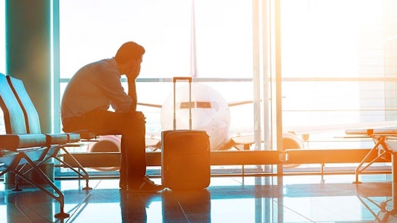 Passenger waits for plane in an airport