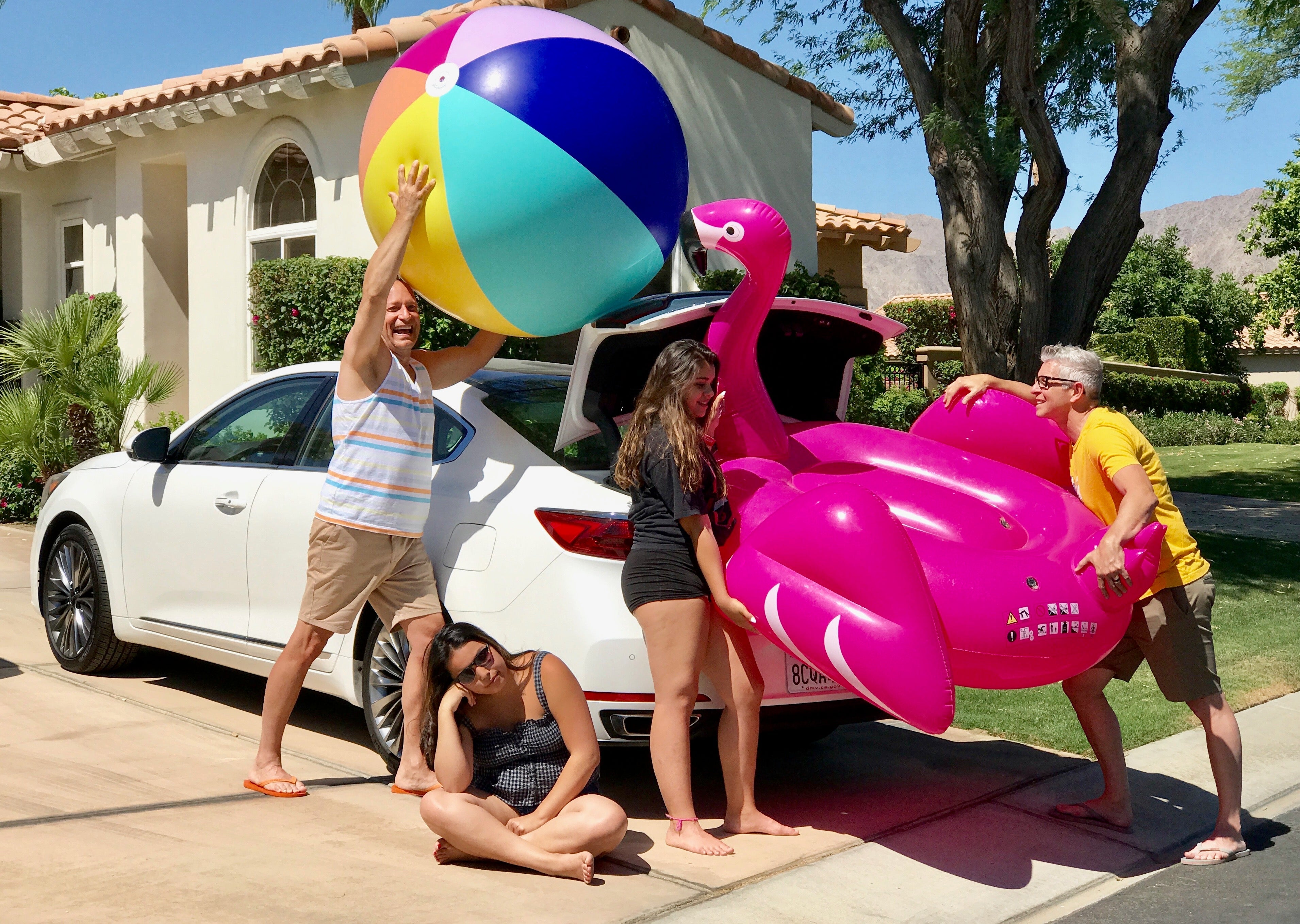The pool toys never seem as big when you buy them, but when you try to bring them home from Palm Springs? Yeah, that.