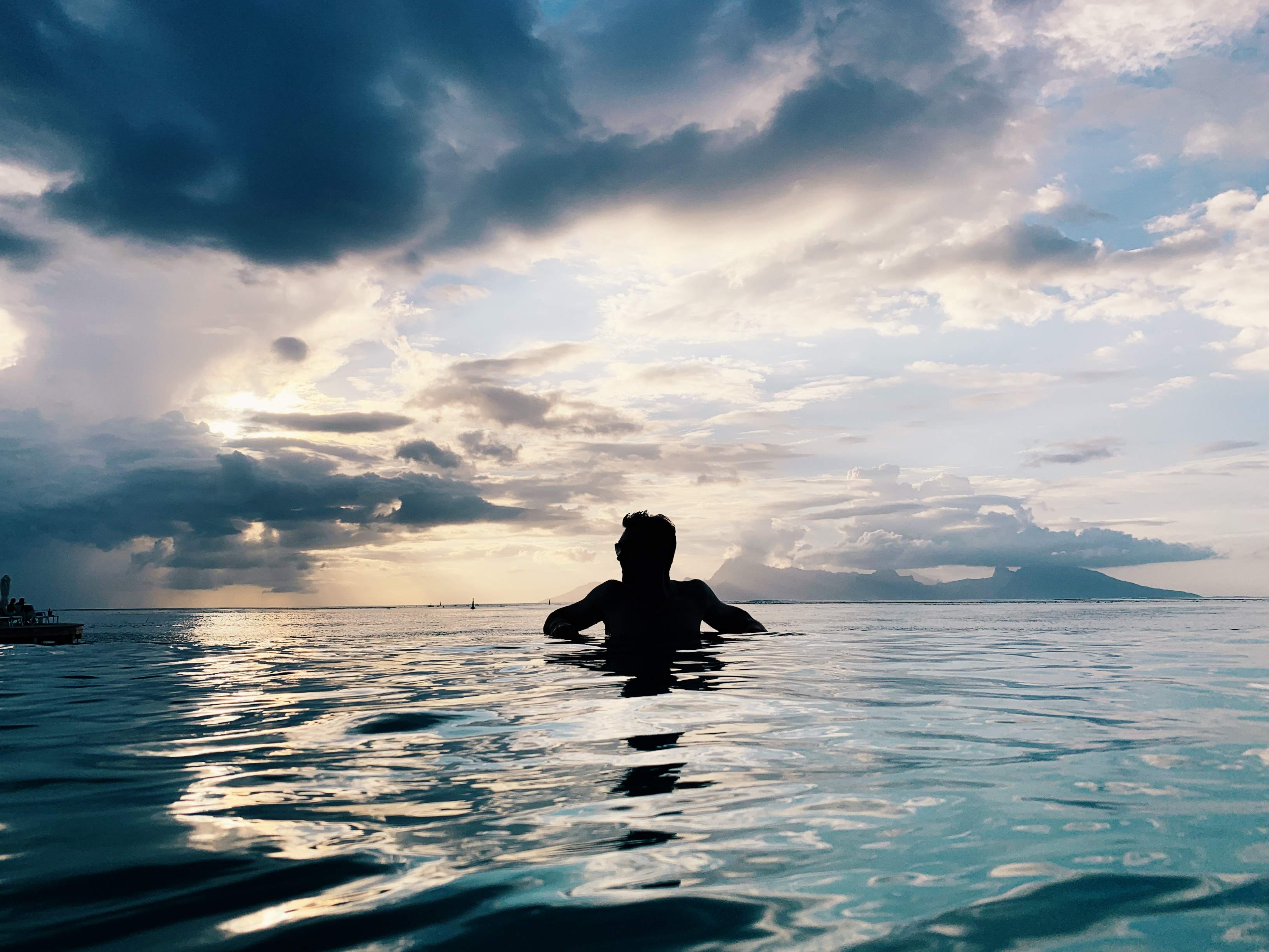 manava infinity pool sunset