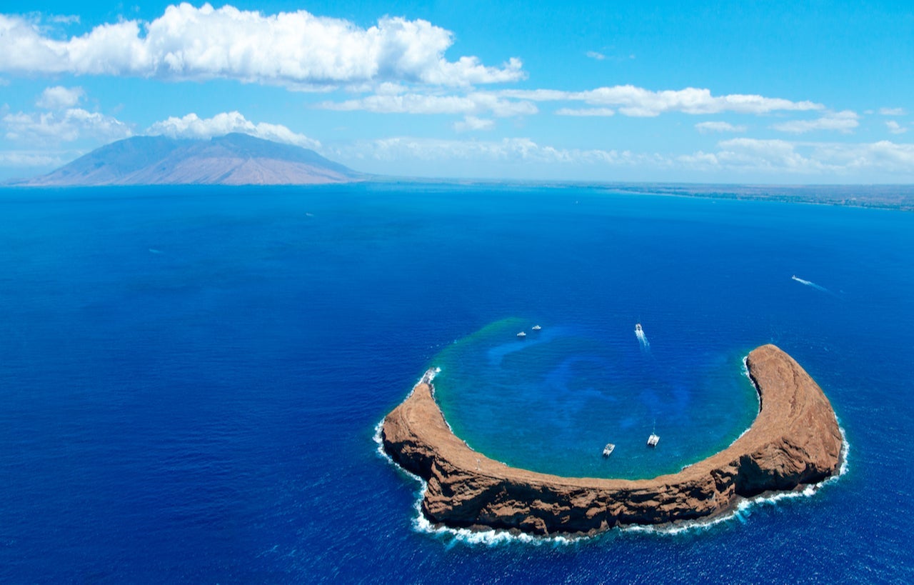 Molokini Crater with West Maui in background. (Photo by M Swiet Productions/Gerry Images)