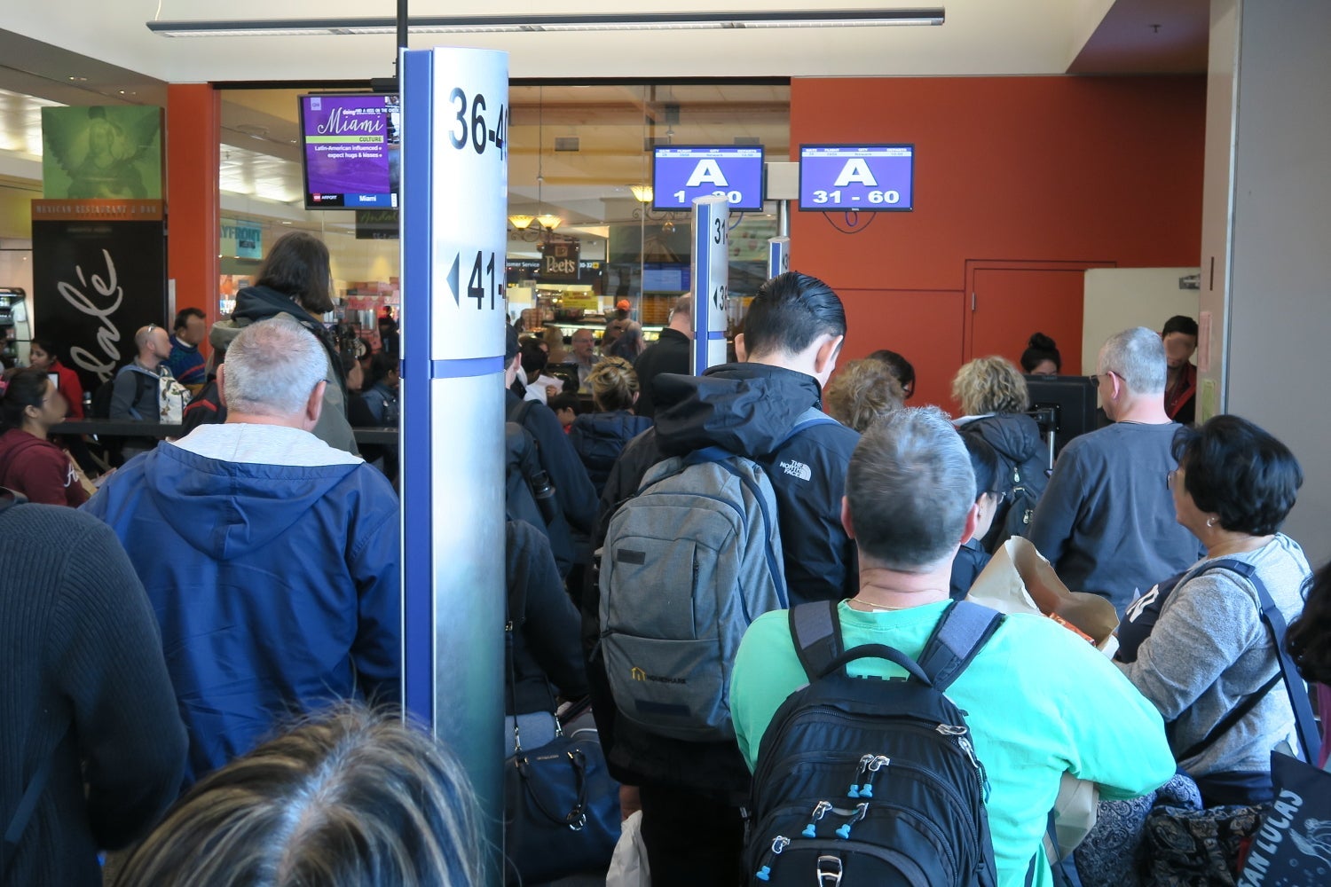 Boarding occurs based on your boarding group and number, so you'll need to line up in order.