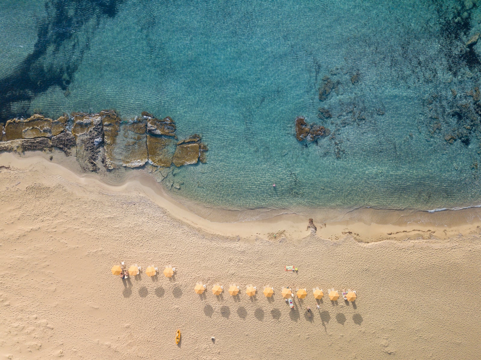 An aerial view of a beach in Crete, Greece. (Photo by Alexander Slash via Unsplash)