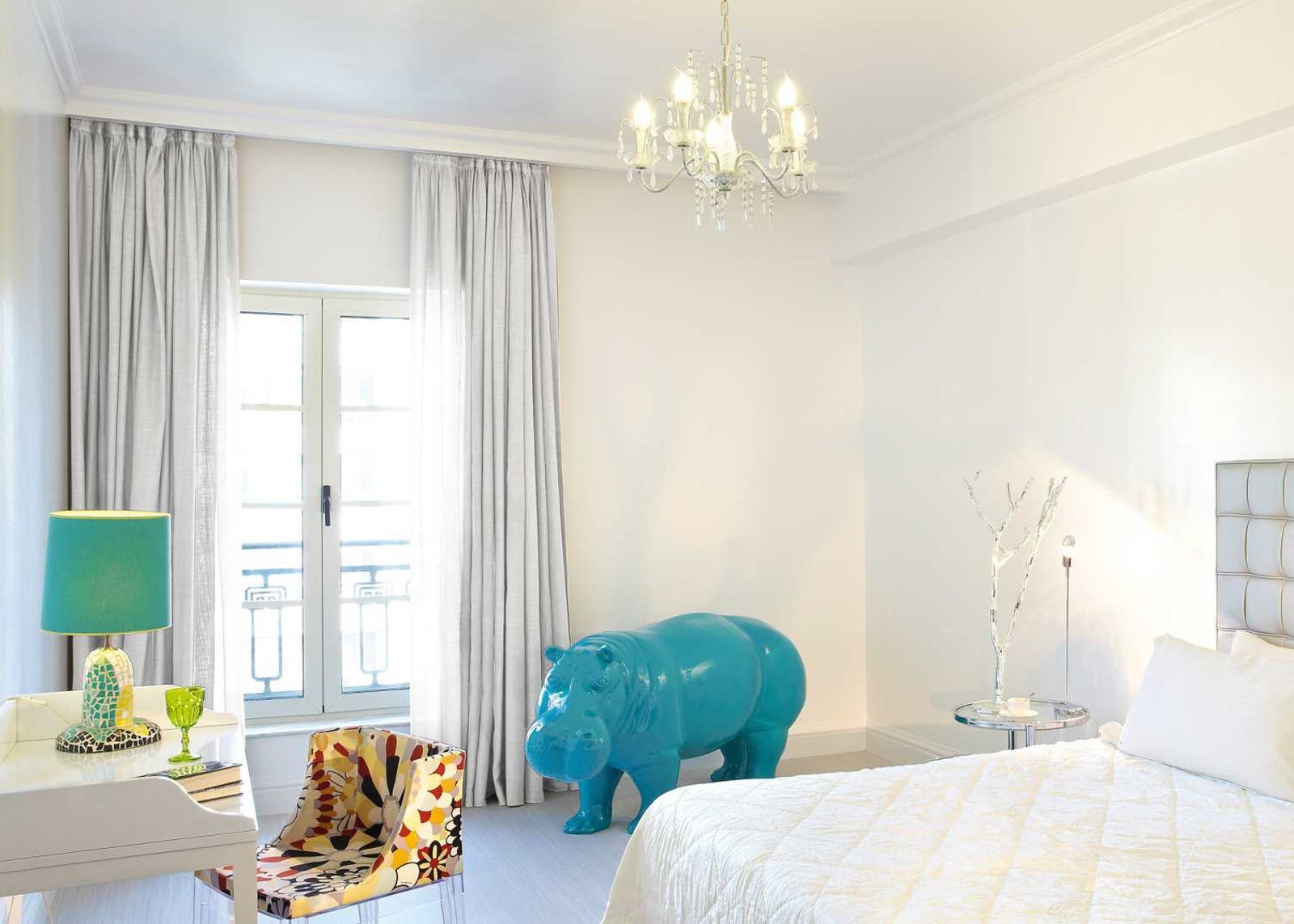 If you get a room at the Pallas Athena Hotel Athens, you may end up with a vibrant, ceramic animal friend in your room. Which is kind of cool. (Photo courtesy of Kuoni)