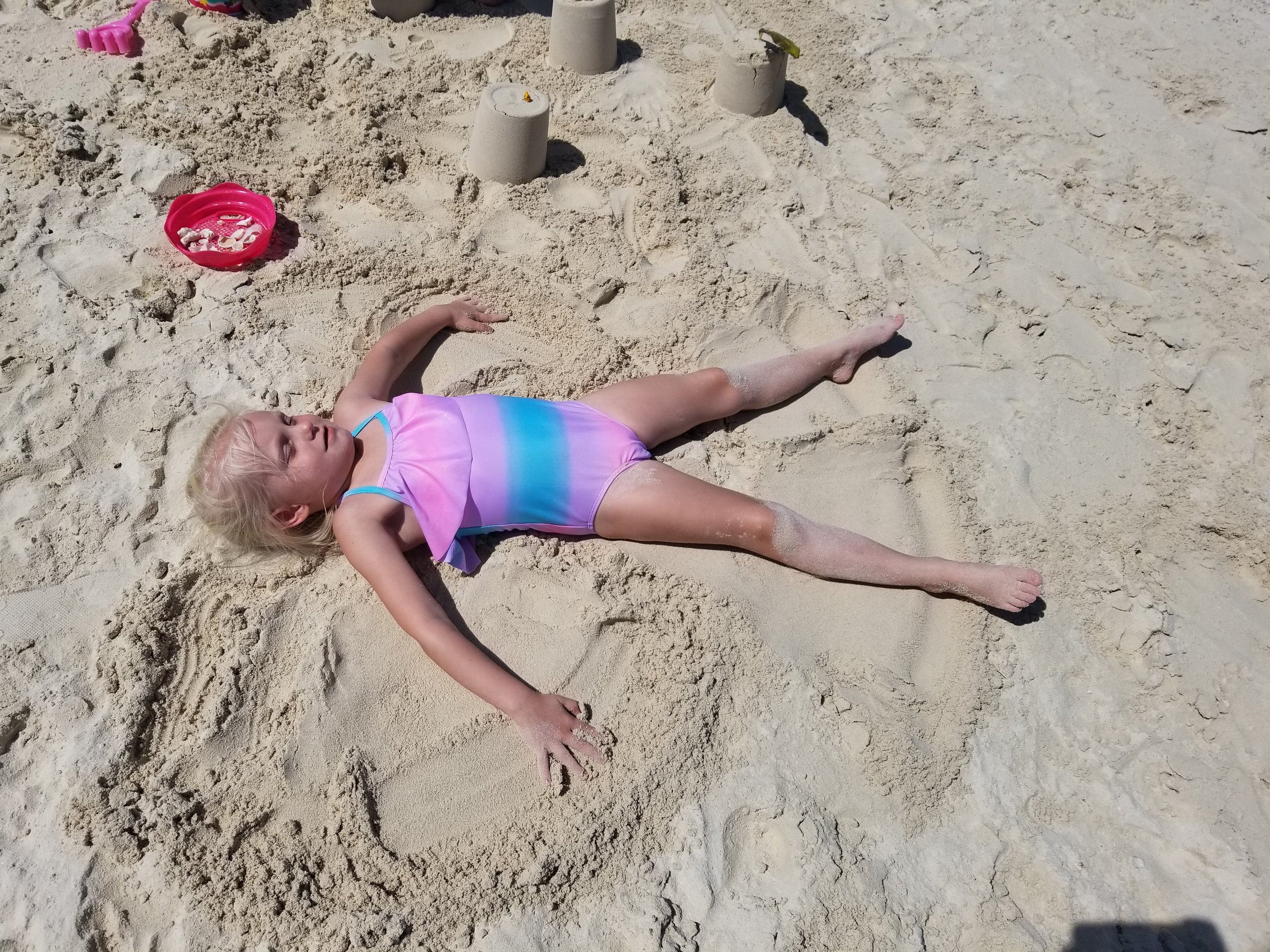 Haydon making sand Angels